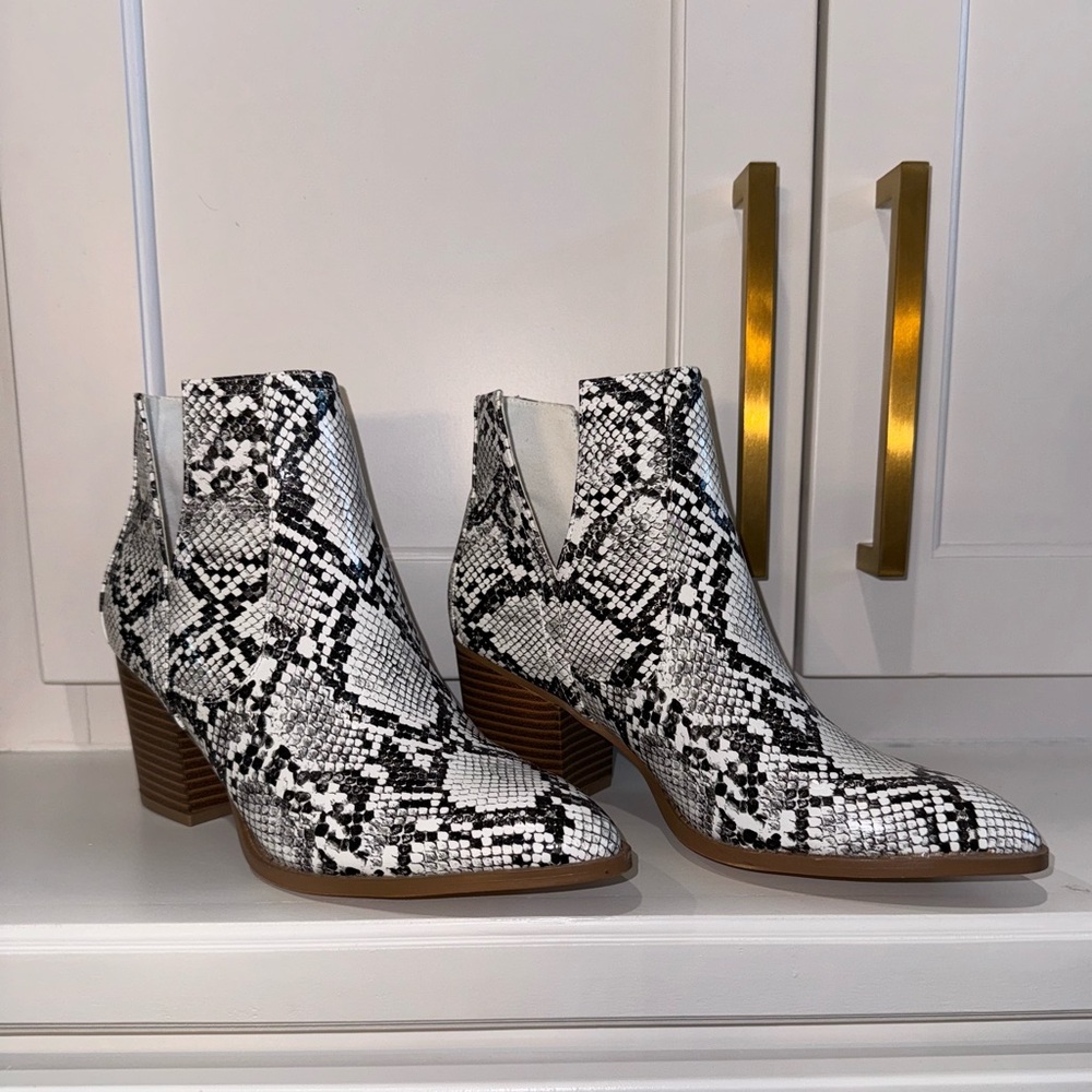 Snakeskin ankle booties, size 7.